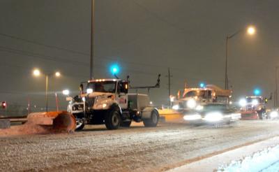 After the snow storm, plows clearing the road