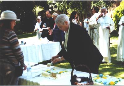 CA and Charles cut cake