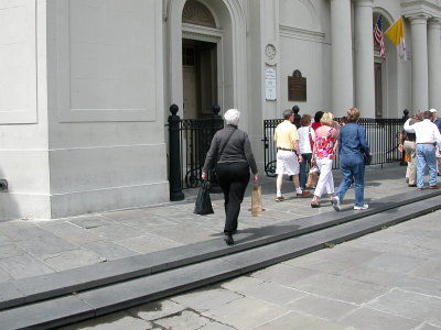 walking to St. Louis Cathedral