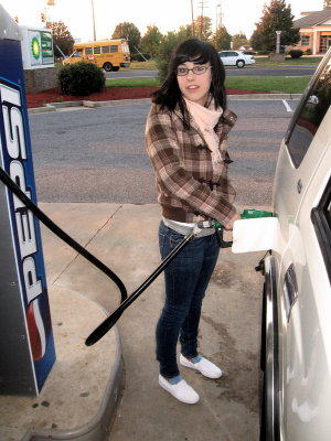 Wow! She actually puts gas in now.
