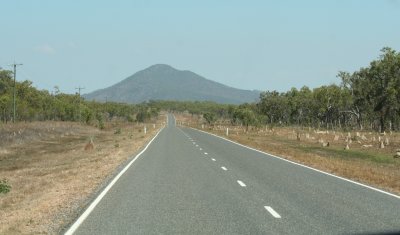 On the road with termite mounds