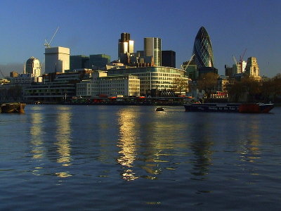 City towers reflecting the sunrise.