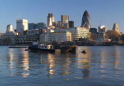 City of London in the sunrise,reflected.