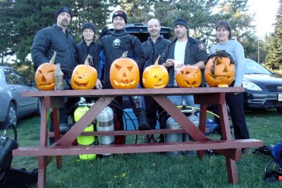 Our group and the finished pumpkins.. Dave, Connie, Ron, Andr, Phil and Claire