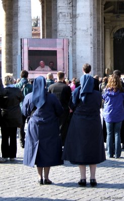 Nuns watching the Pope on TV (Vatican City)