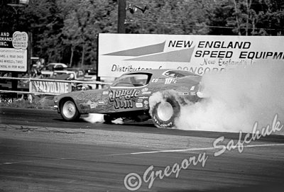 Jungle camaro blows engine on burnout.jpg