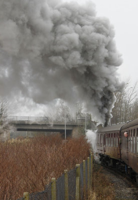 Black smoke and steam