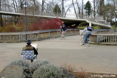 Artist, bikers and bridge