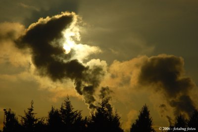 Smoke, clouds and sun
