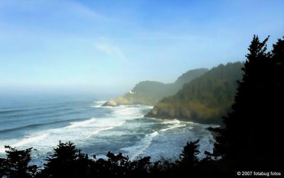 Heceta Beach with lighthouse on the Head