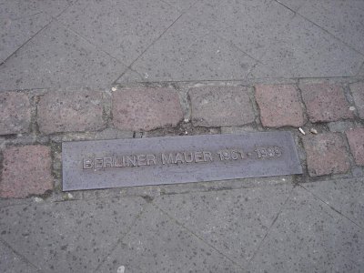 marking the former line of the wall through the city...