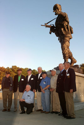 Veterans of Detachment 101 and special reunion guest British Lord Sir John Slim (second from right) gather to pose beneath the statue of Colonel Arthur D. Bull Simons.  The Association held a reunion at Fort Bragg in 1991 that included about 100 veterans of the tiny fighting unit. Only eight veterans healthy enough to participate in the reunion made their way to Fort Bragg in 2007.