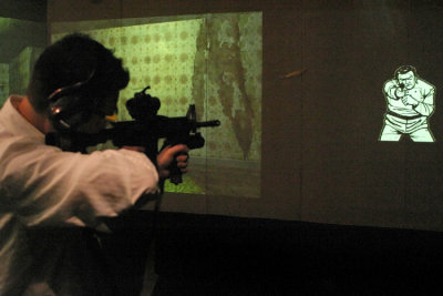 After a demonstration of indoor virtual training, Im given the opportunity to fire live rounds from an M4 semi-automatic rifle, the Armys current replacement of the M16. Indoor live-fire exercises are made possible because of black insulation bricks that line the walls and ceiling of the room. Made from recycled tires, they can take hundreds of direct hits before needing to be replaced.