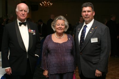 The final nights formal banquet dinner was held at the Pope Air Force Base Officers Club. Patrick Ferry (left) poses for a photo with British Lord Sir John Slim and his wife Buffy. Slim served in the China Burma India theater under the command of his father, Field Marshal 1st Viscount William Joseph Slim.