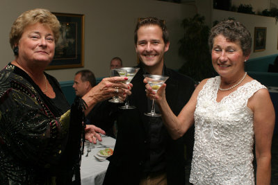 Christine Sajdyk (left) and her sister Penny Hicks propose a toast with Hollywood screenwriter Mikko Alanne at the banquet. Alanne was in attendance to meet 101 veterans and conduct research for the upcoming film adaptation of the book Four Hours in My Lai, the story of Christine and Pennys father General William Peers investigation of the My Lai Massacre during the Vietnam War. Bruce Willis will star as Peers, who was also Detachment 101s commander through the second half of World War II. The film, titled Pinkville, will be directed by Oliver Stone.
