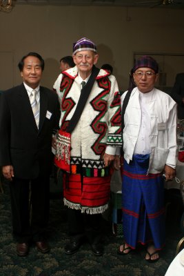 Lutken, now donning native Burmese garments, poses with the Associations distinguished guests Dr. Hkyet Aung (left) and D. Ah Hpung at the end of the night.