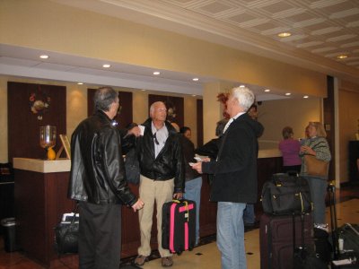 Charlie Siegel, Gerry Mark & Mark Abraham checking in (Nancy Leitner in right background)