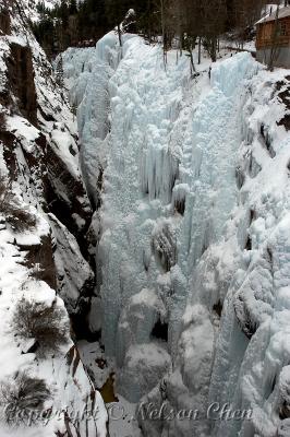 An ice climber at the bottom