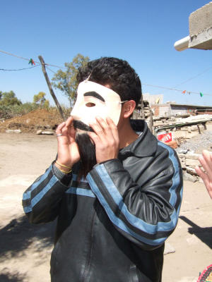 Alfonso models his mask