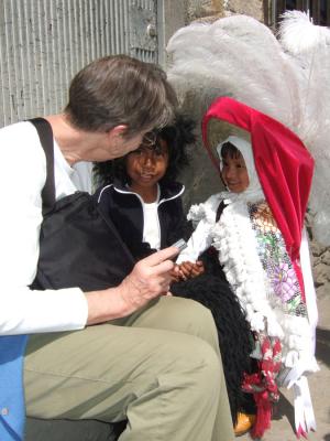 Holly chats with locals in Papalotla