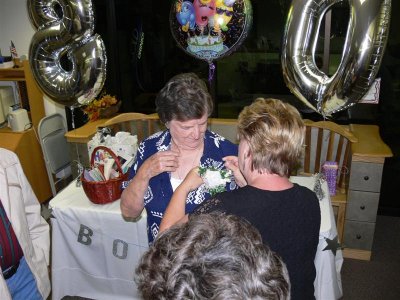 Carolyn pinning Judy's courage on Bonnie