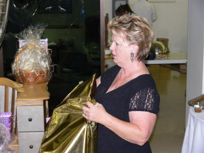 Carolyn opening Fannie & Randy's present