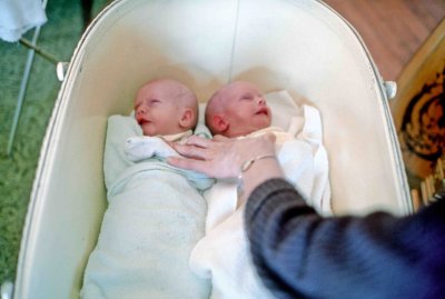 06 Keith & Erica & Beth's hand in bassinet copy.jpg