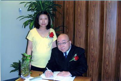 Brian Signing Marriage Licence.jpg
