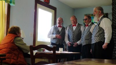 Breakfast at the Breakfast Place find the Barbershop Quartet...