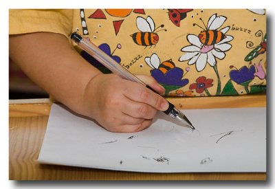 ....drawing with an ink pen.