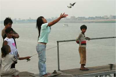 releasing birds-Phnom Penh