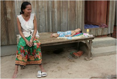 Mother and sleeping child-Phnom Penh