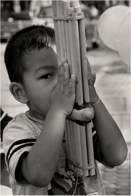 Little boy with Khaen flute-Thailand