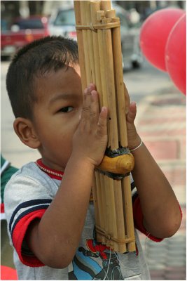 Little boy with khaen flute-Roi Et