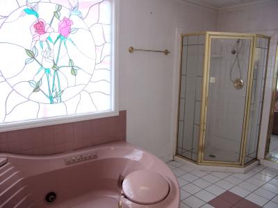 Jacuzzi and stained glass window