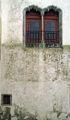 Two  rich twins sisters and poor, small and lonely window