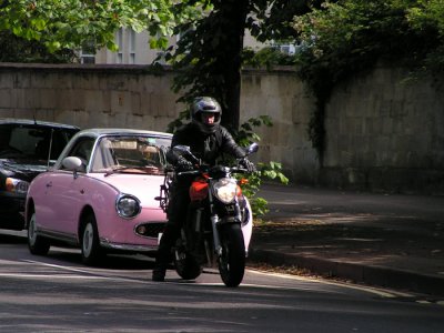 a cute little pink car...