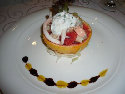 Seafood and fresh Lily Bud Salad in Grapefruit cup with lime Crabmeat Mousse
