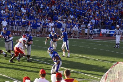 Reesing handing off to Sharp