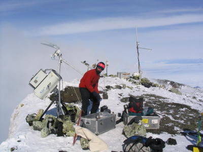 Clive with infrared and radar instruments on rim.JPG