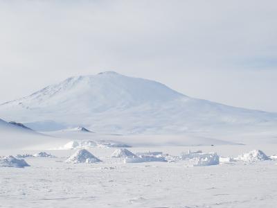 Snowmound City: hollowed out piles of snow sleep 3 and Mt. Erebus.JPG