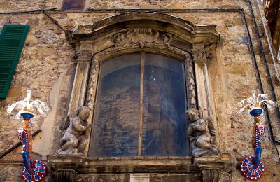 madonna behind window