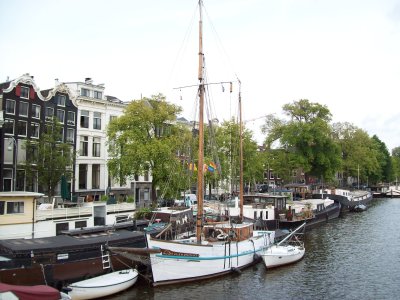 One of the nicest sailboats in the city seen from the skinny bridge Amsterdam NL