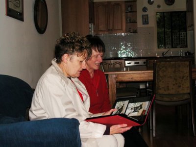 Joy and Barb looking at Joy's book of dogs
