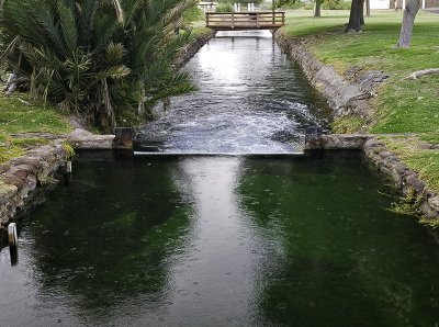 Canal with motel on near left