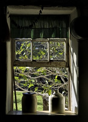 Crock and jug in window