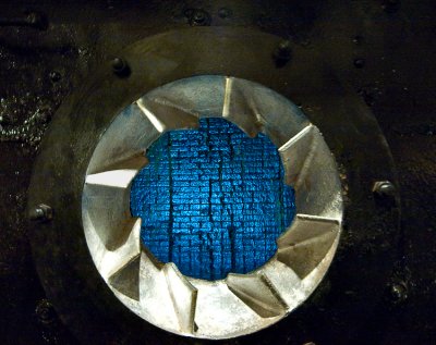 Looking inside boiler through burner vortex to lining bricks