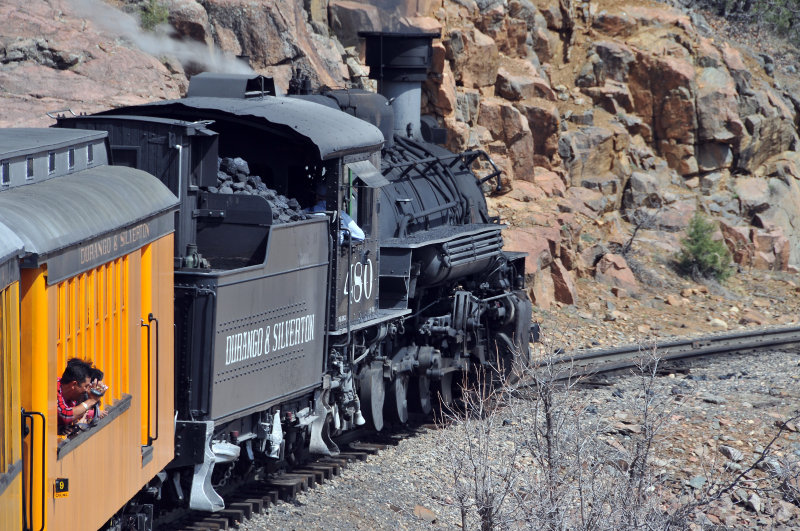 Engine pulls past.