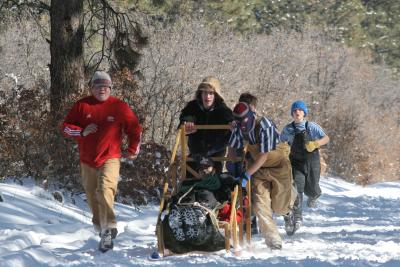 Racing back after apply a splint to the leg of Josh