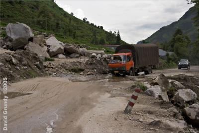 NuJiang Valley - There's only one road in, and it needs repair.  This was a frequent sort of obstacle.  Glad of the 4WD!